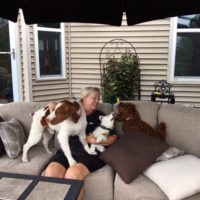 Julie loving on the puppies at Boot Camp.