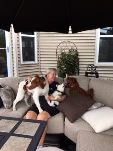 Julie loving on the puppies at Boot Camp.